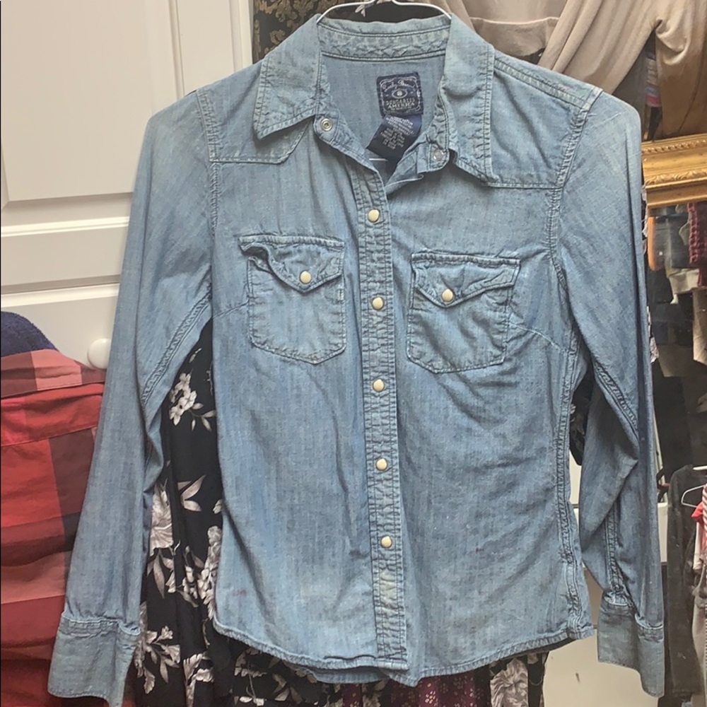 Distressed Lucky Brand shirt.